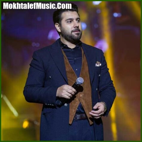 دانلود آهنگ احسان خواجه امیری بارون خیابونارو میبنده